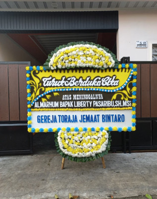 Papan Bunga Duka di Egiam